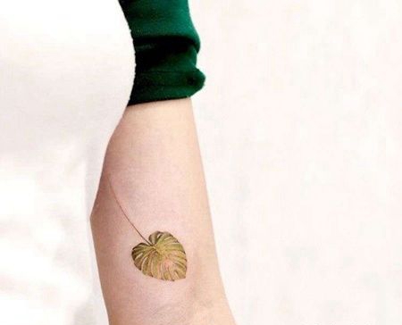 写实大臂叶子纹身图案