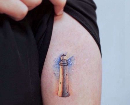 小清新大臂灯塔纹身图案