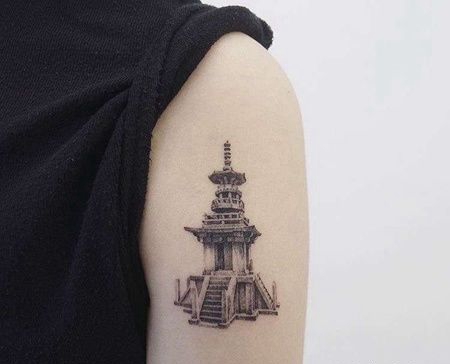 写实大臂建筑纹身图案