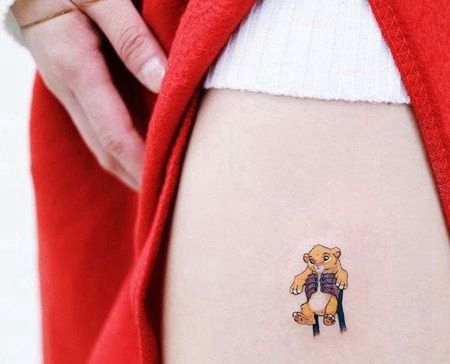 卡通大腿狮子王辛巴纹身图案