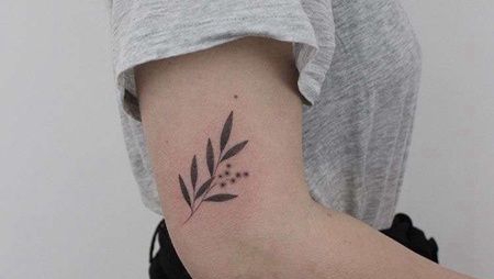点刺大臂叶子纹身图案