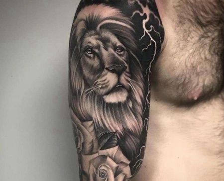 写实大臂狮子玫瑰纹身图案