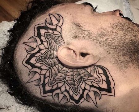 几何头部繁花纹身图案