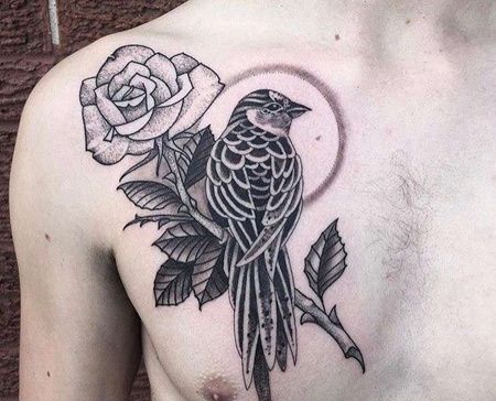 前胸玫瑰鸟纹身图案