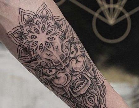 点刺小臂唐狮纹身图案