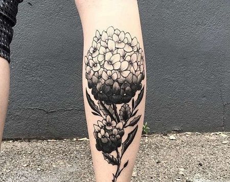 小腿花卉满天星纹身图案