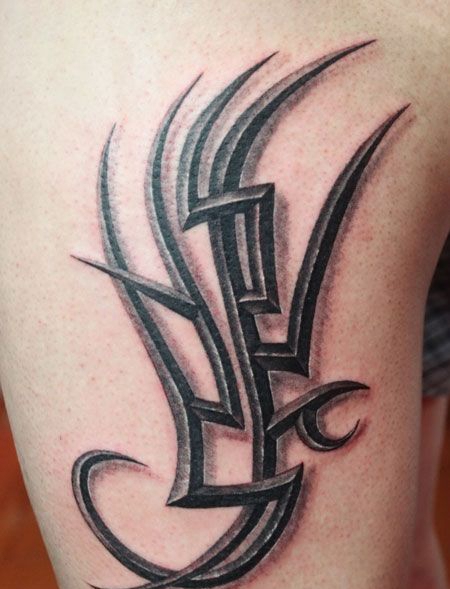 腿部抽象图腾纹身图案