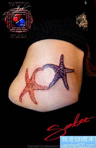 可爱的美女侧腰海星纹身图案