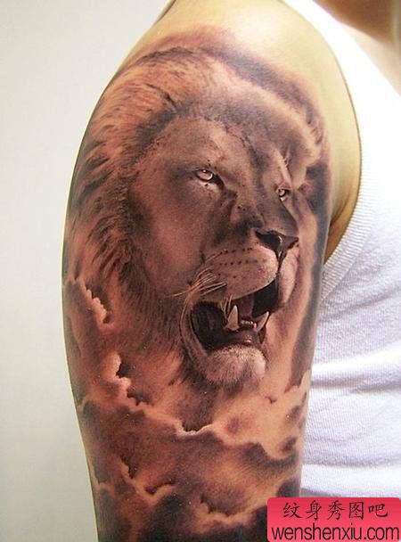 纹身:大臂狮子头纹身图案图片