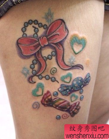 女性纹身图案:腿部彩色蝴蝶结爱心糖果纹身图案纹身图片