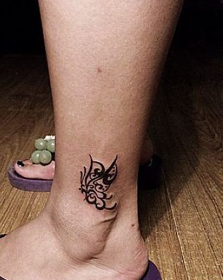 腿部纹身图案:腿部图腾蝴蝶纹身图案