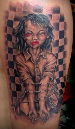 欧美纹身图案：手臂另类欧美娃娃纹身图案