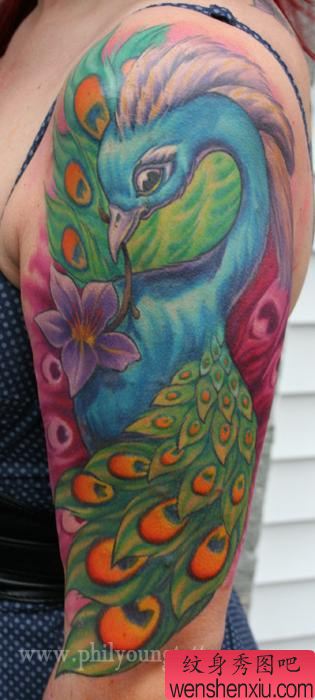 大臂纹身图案:大臂孔雀纹身图案
