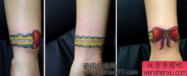 流行时尚的手臂蝴蝶结蕾丝纹身图案