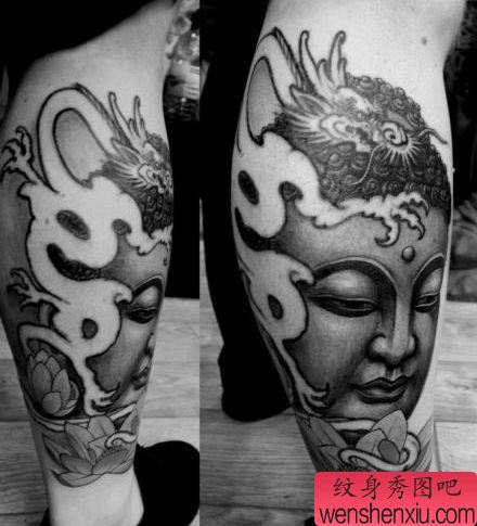 腿部一幅佛头纹身图案