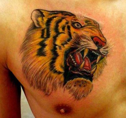 胸部霸气好看的虎头纹身图案