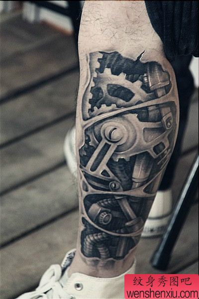 腿部时尚帅气的机械臂纹身图案