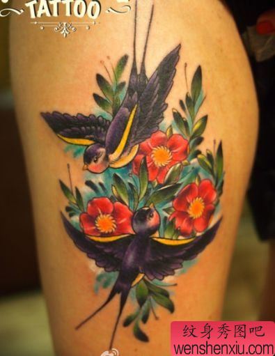 腿部一幅欧美风格小燕子樱花纹身图案