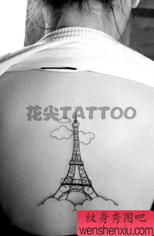 女生背部一幅巴黎铁塔纹身图案