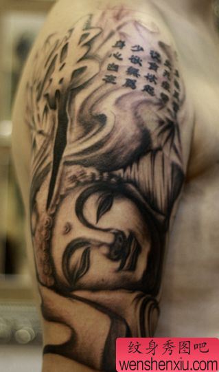 大臂帅气的佛头纹身图案