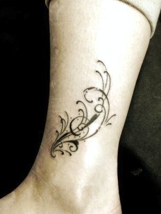 女孩子腿部图腾藤蔓纹身图案