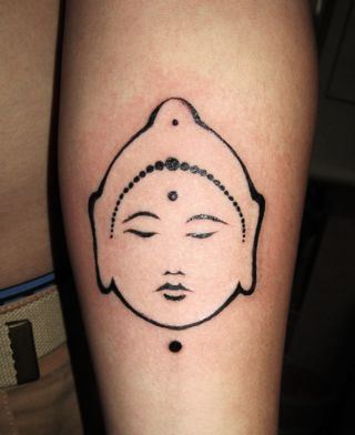 手臂可爱的图腾佛头纹身图案
