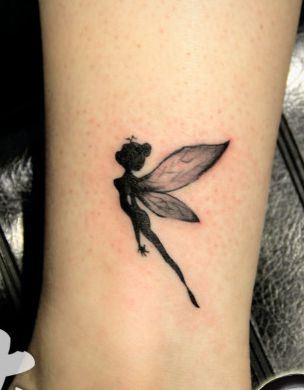 女孩子腿部图腾小精灵纹身图案