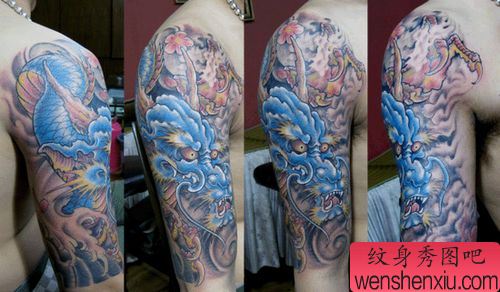 手臂霸气精美的龙纹身图案