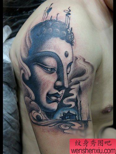 手臂一幅经典帅气的佛头纹身图案