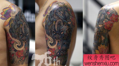 手臂霸气的神兽年兽纹身图案