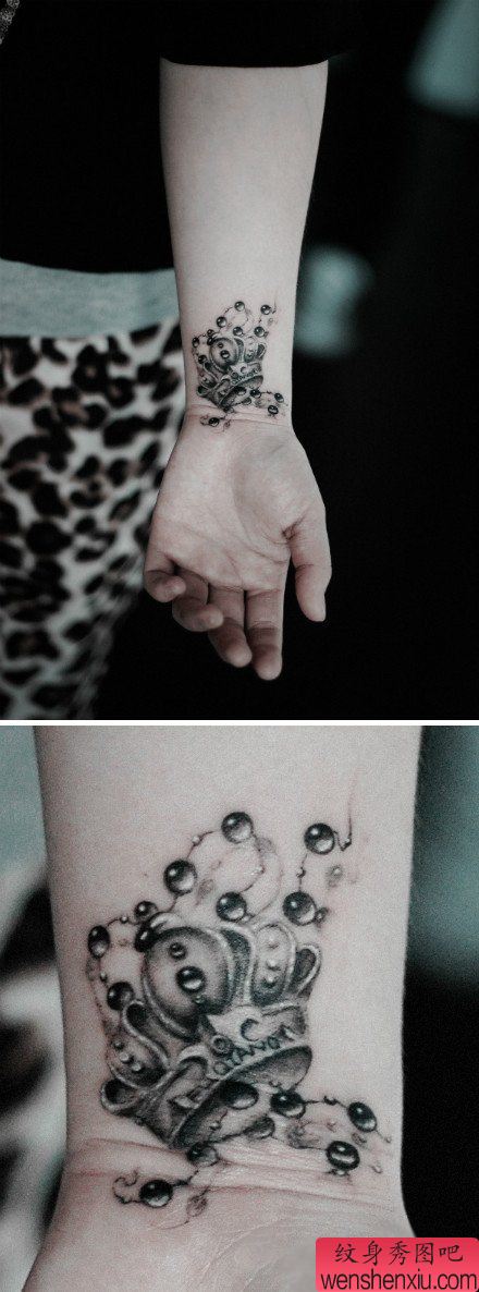 女生手腕处皇冠与链条纹身图案
