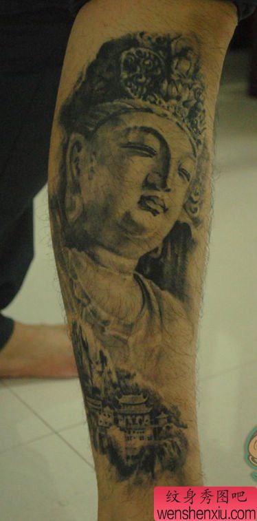 腿部经典的观音石雕纹身图案