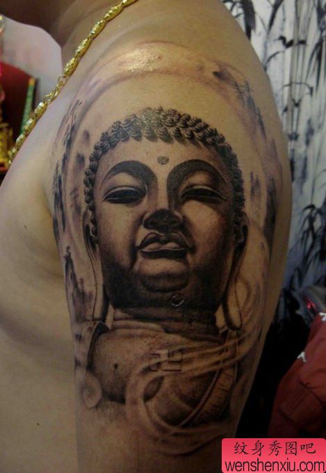 男性手臂帅气的佛头纹身图案