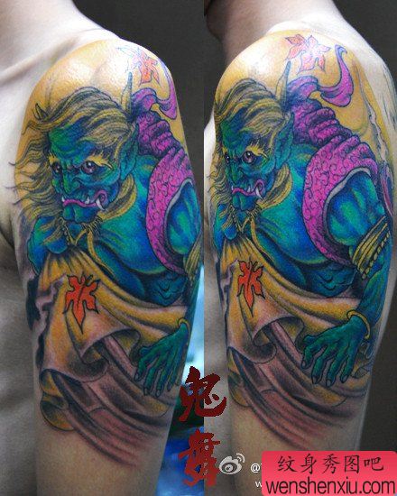 手臂超靓的彩色风神纹身图案