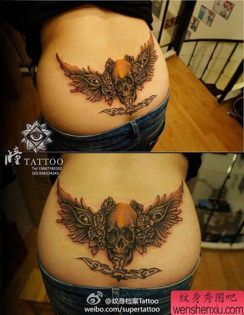 美女腰部很酷的翅膀与骷髅纹身图案