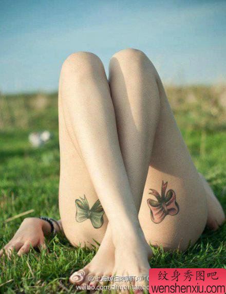 女生腿部流行时尚的蝴蝶结纹身图案