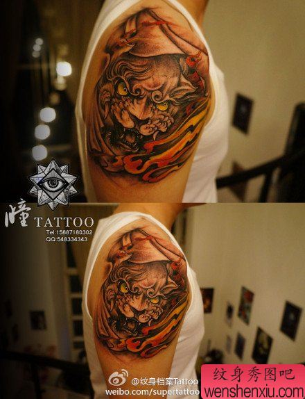 男性手臂霸气的唐狮子纹身图案