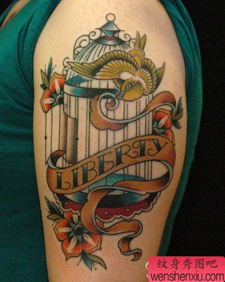 手臂一幅欧美风格的小鸟与鸟笼纹身图案