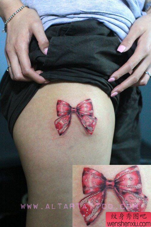 女生大腿处好看时尚的蝴蝶结纹身图案