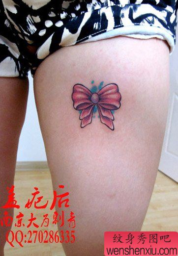 女生腿部时尚的蝴蝶结纹身图案