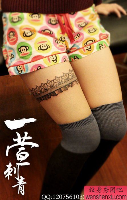 女生大腿流行时尚的蕾丝纹身图案
