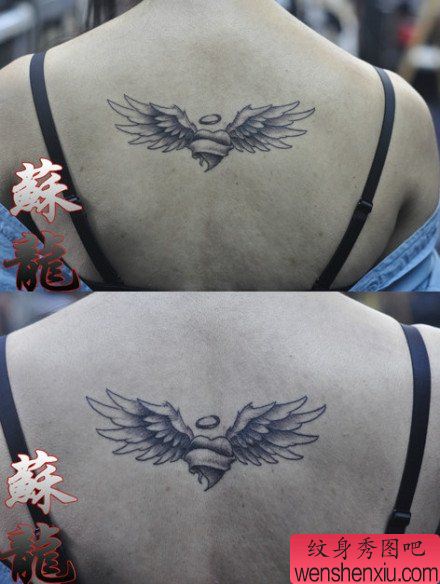 女生背部流行时尚的爱心翅膀纹身图案