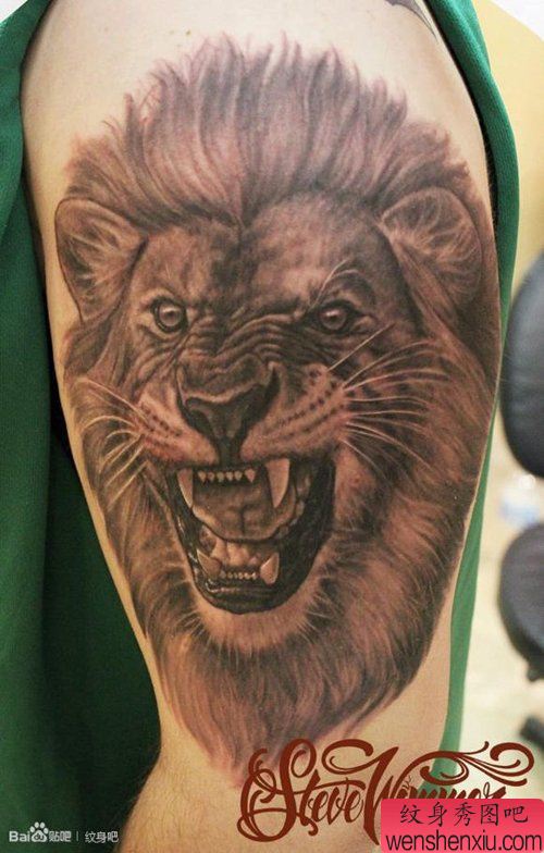 霸气经典的男性手臂狮头纹身图案