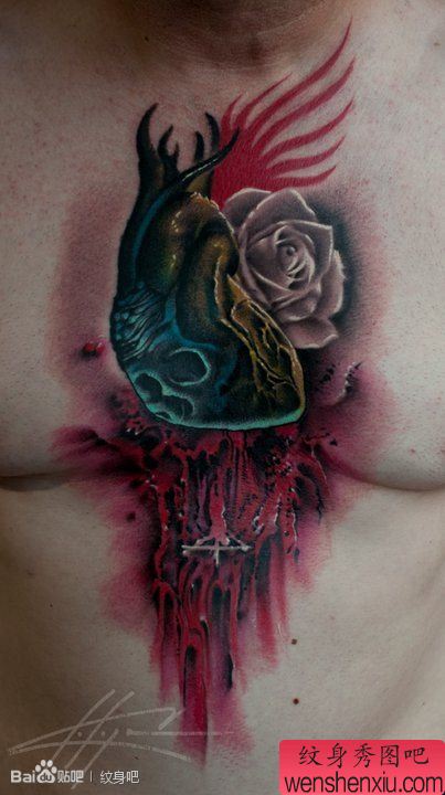 男性前胸超酷的一幅骷髅心脏纹身图案