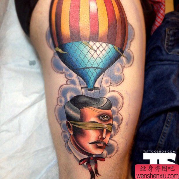 腿部一幅创意狂想曲文身作品