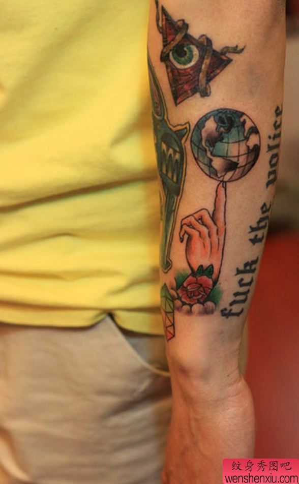 纹身秀图吧推荐一幅手臂地球仪纹身图案