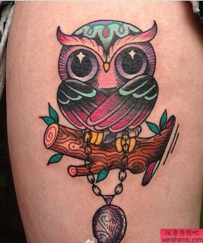 一幅手臂猫头鹰刺青图案