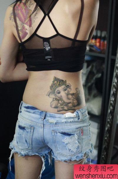 纹身秀图吧推荐一幅女人侧腰象神纹身图案
