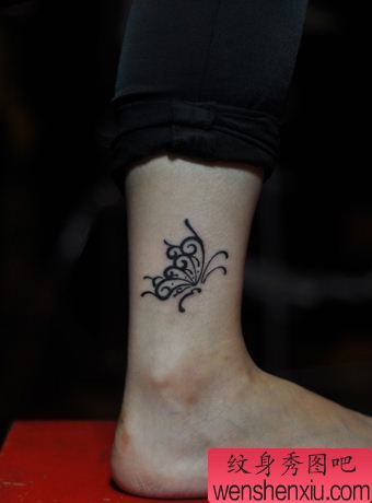 纹身秀图吧推荐一幅腿部图腾蝴蝶纹身图案