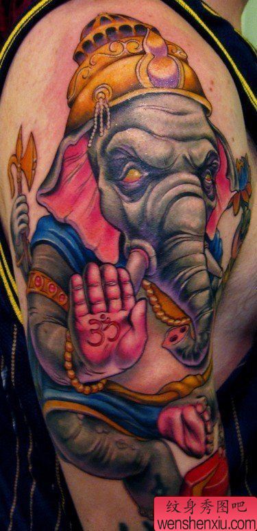 一幅欧美风格大臂彩色象神纹身图案